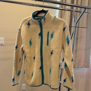 Cream Fleece Jacket with Blue Lightning Pattern